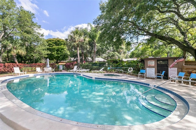 pool with a patio
