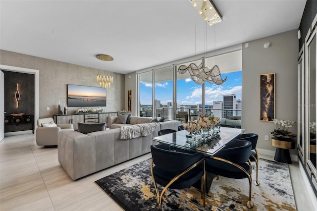 living room with a chandelier, expansive windows, and light tile patterned floors