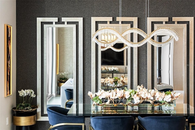 dining area featuring a chandelier