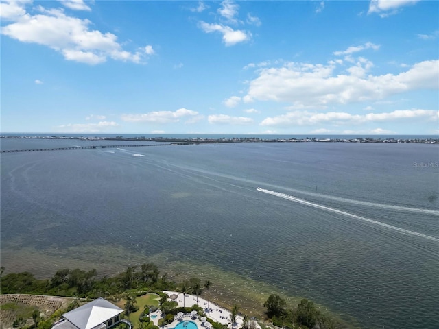 aerial view of a large body of water and a notable bridge
