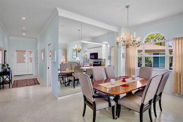 dining space featuring crown molding, recessed lighting, and an inviting chandelier