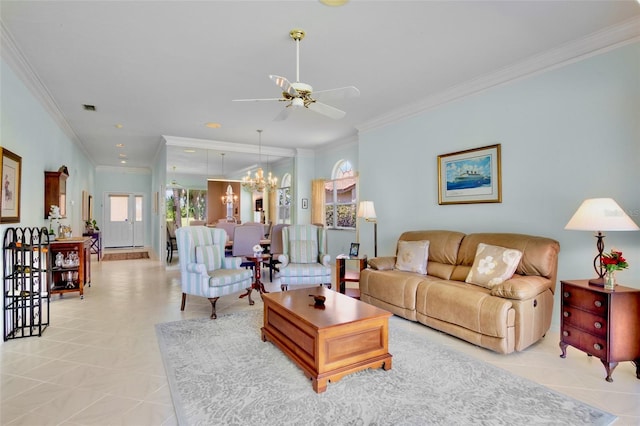 living room featuring ornamental molding, ceiling fan with notable chandelier, and visible vents