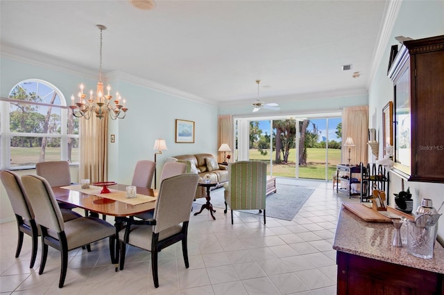 dining area with a healthy amount of sunlight, crown molding, and ceiling fan with notable chandelier