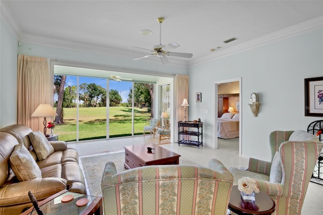 living area featuring crown molding, ceiling fan, light tile patterned floors, and visible vents