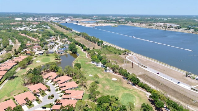 aerial view with a water view, golf course view, and a residential view