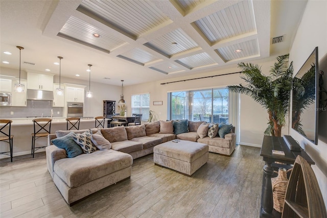 6001 Anise Dr, Sarasota, FL 34238 - living area featuring beam ceiling, light wood-style floors, recessed lighting, visible vents, and coffered ceiling