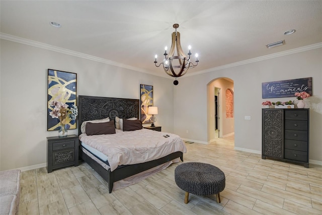 6001 Anise Dr, Sarasota, FL 34238 - bedroom featuring crown molding, an inviting chandelier, arched walkways, baseboards, and visible vents