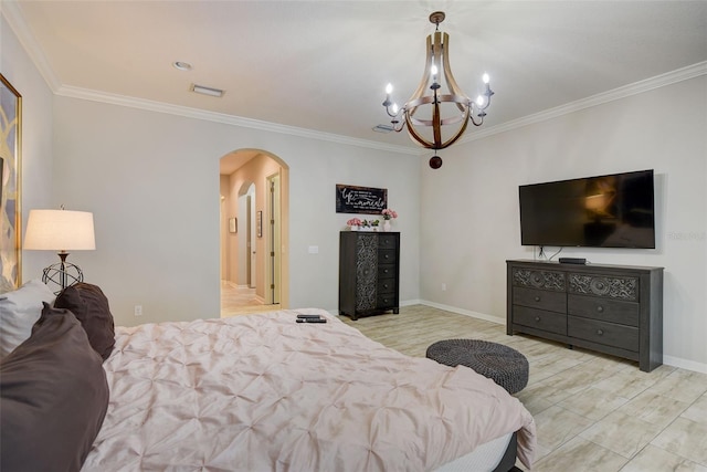 6001 Anise Dr, Sarasota, FL 34238 - bedroom with visible vents, arched walkways, crown molding, and an inviting chandelier