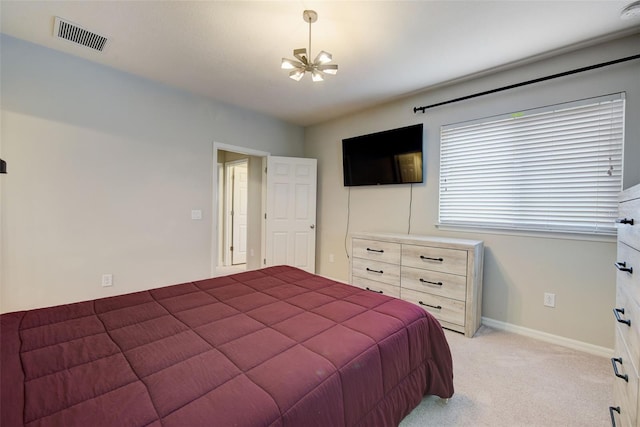 6001 Anise Dr, Sarasota, FL 34238 - bedroom featuring visible vents, baseboards, an inviting chandelier, and light colored carpet