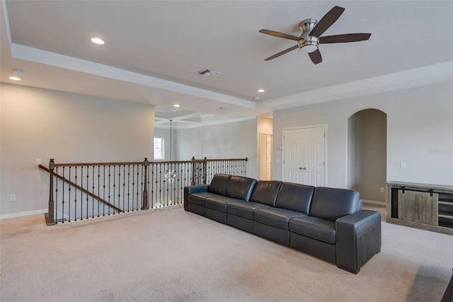 6001 Anise Dr, Sarasota, FL 34238 - living room with ceiling fan, a raised ceiling, carpet floors, recessed lighting, and visible vents