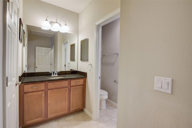 6001 Anise Dr, Sarasota, FL 34238 - bathroom with tile patterned flooring, toilet, and vanity