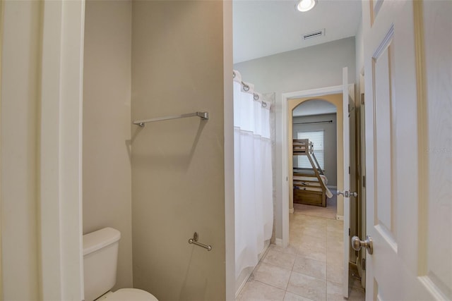6001 Anise Dr, Sarasota, FL 34238 - full bathroom with tile patterned floors, toilet, and visible vents