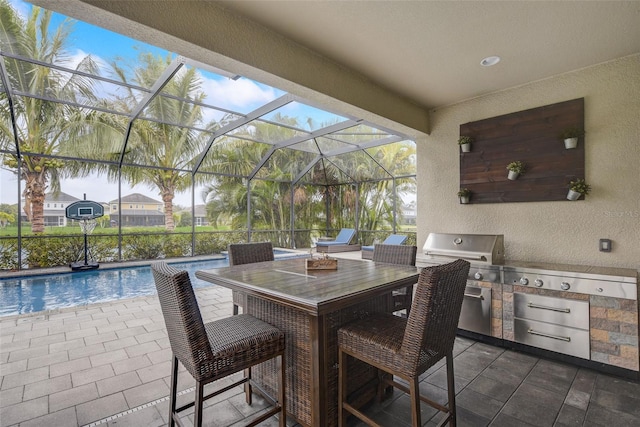 6001 Anise Dr, Sarasota, FL 34238 - view of patio with area for grilling, an outdoor pool, glass enclosure, and a grill