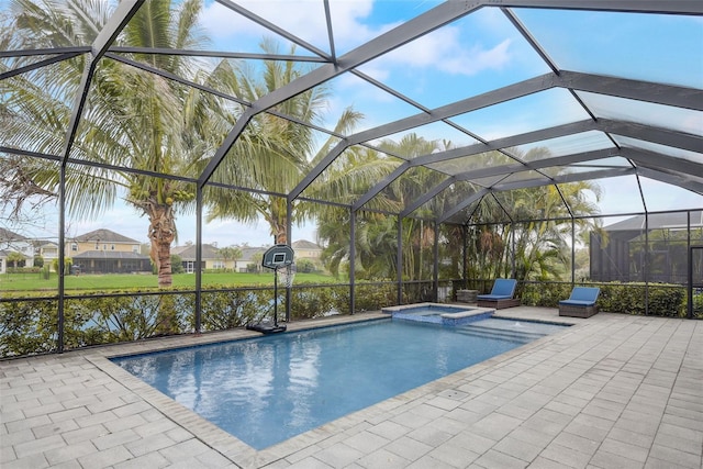 6001 Anise Dr, Sarasota, FL 34238 - view of swimming pool with glass enclosure, a patio area, and a pool with connected hot tub
