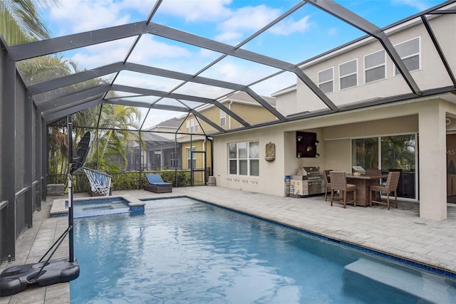 6001 Anise Dr, Sarasota, FL 34238 - view of swimming pool with a lanai, a patio, a pool with connected hot tub, and a grill