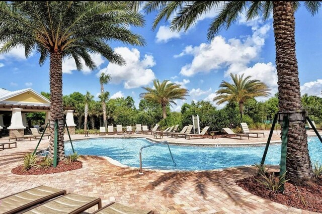 6001 Anise Dr, Sarasota, FL 34238 - pool with a patio