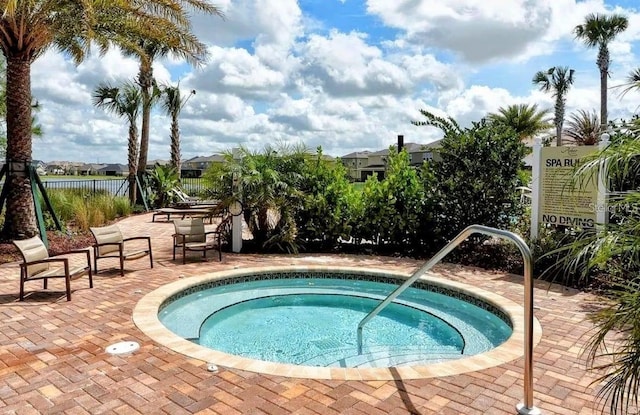 6001 Anise Dr, Sarasota, FL 34238 - view of pool with a patio, fence, and a community hot tub