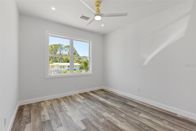 532 Yale Rd, Venice, FL 34293 - empty room featuring baseboards, a ceiling fan, wood finished floors, and visible vents