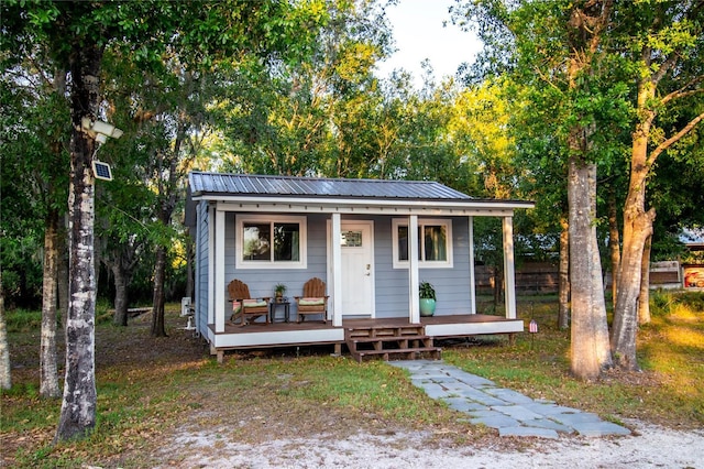 view of outdoor structure with a porch