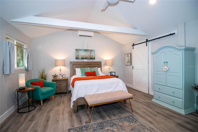 bedroom with a barn door, a wall mounted air conditioner, wood finished floors, baseboards, and vaulted ceiling with beams
