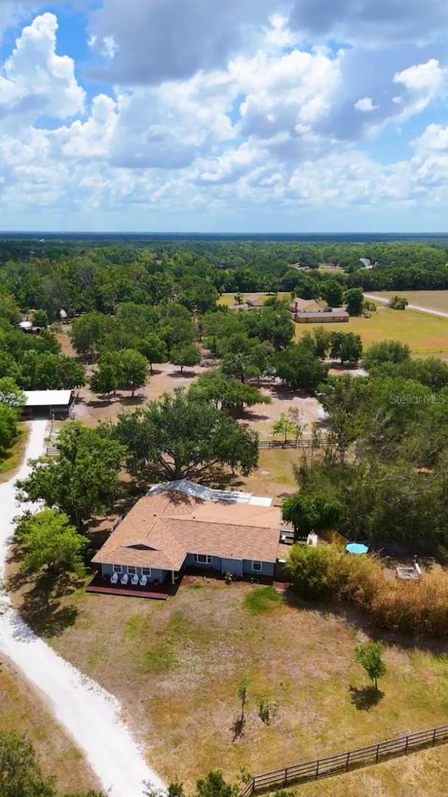 bird's eye view with a forest view