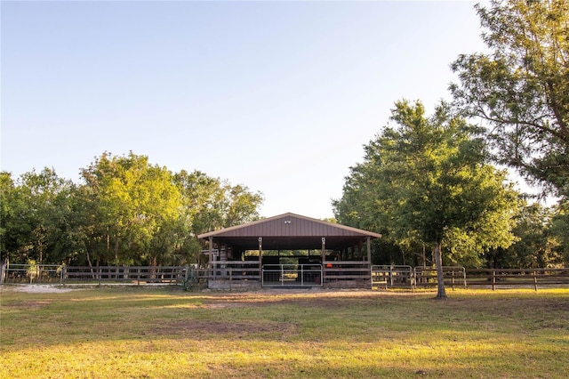 view of home's community featuring an outbuilding and an exterior structure