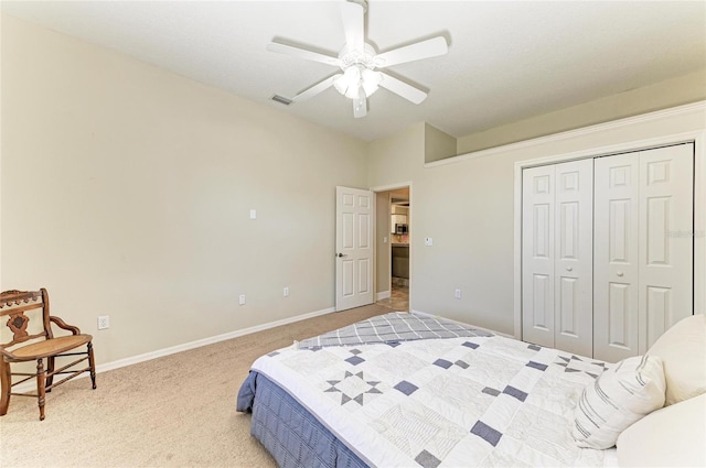 bedroom with light carpet, a ceiling fan, baseboards, visible vents, and a closet