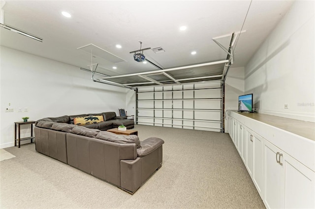 garage with recessed lighting and visible vents