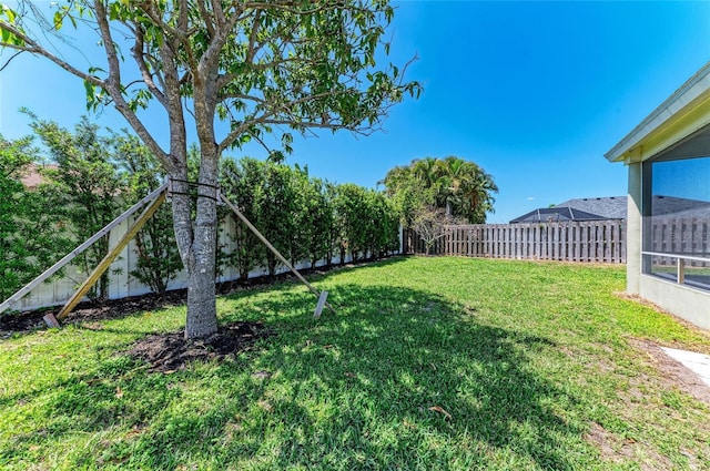 view of yard featuring a fenced backyard