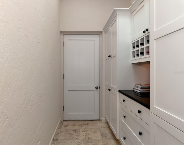 4307 Camino Real, Sarasota, FL 34231 - doorway to outside with baseboards