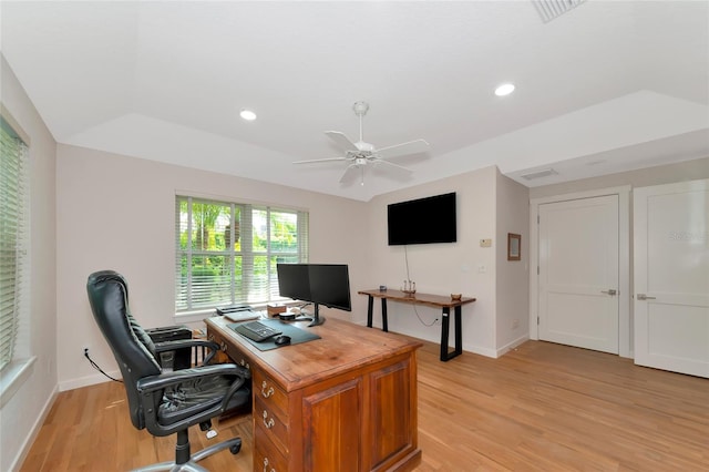 4307 Camino Real, Sarasota, FL 34231 - home office featuring light wood-style floors, a ceiling fan, baseboards, recessed lighting, and a tray ceiling