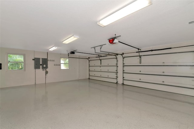 4307 Camino Real, Sarasota, FL 34231 - garage with electric panel and a garage door opener