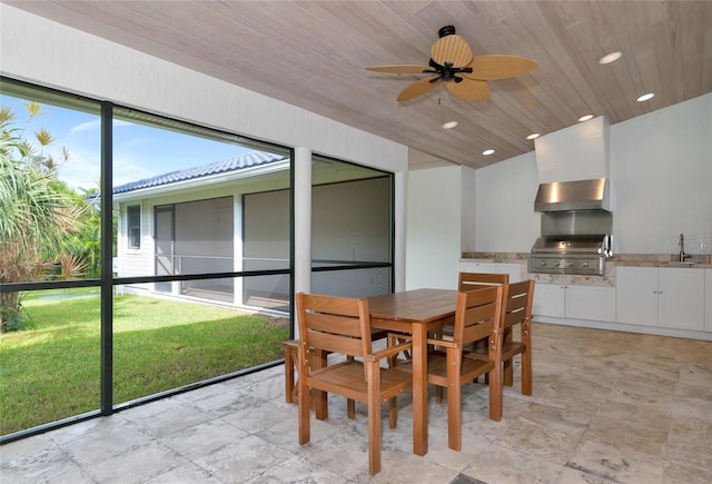 4307 Camino Real, Sarasota, FL 34231 - dining area with ceiling fan, wood ceiling, recessed lighting, and light stone finish flooring