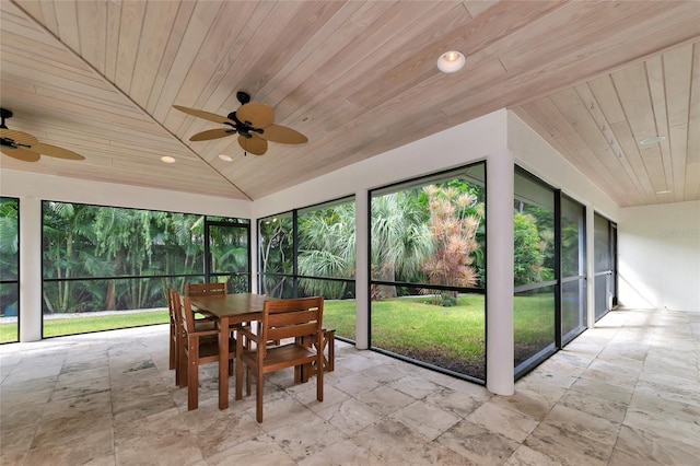 4307 Camino Real, Sarasota, FL 34231 - sunroom / solarium with a ceiling fan, wood ceiling, vaulted ceiling, outdoor dining area, and stone finish flooring