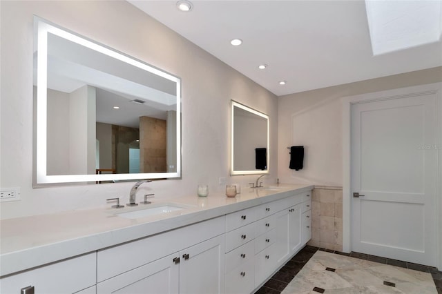 4307 Camino Real, Sarasota, FL 34231 - full bathroom featuring double vanity, recessed lighting, and a shower