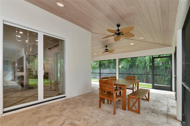4307 Camino Real, Sarasota, FL 34231 - sunroom / solarium featuring a ceiling fan and outdoor dining area