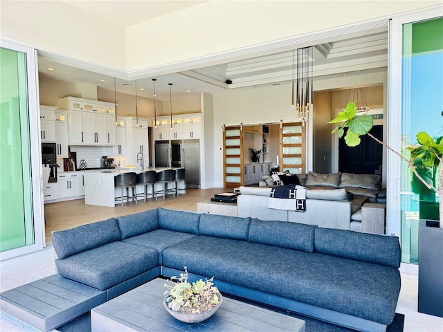 living area featuring a high ceiling