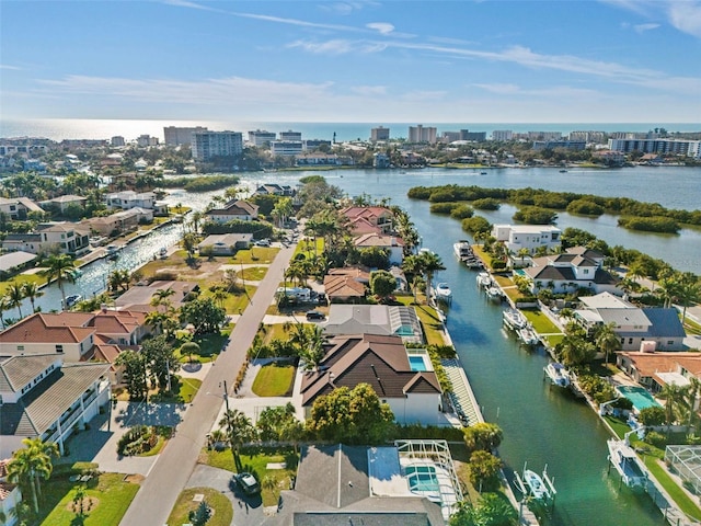 bird's eye view featuring a city view and a water view