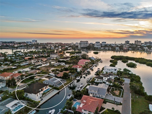 aerial view with a view of city and a water view