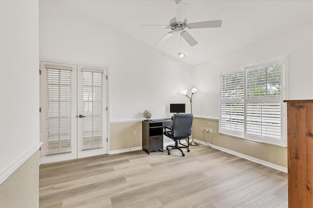 office area featuring french doors, ceiling fan, wood finished floors, and lofted ceiling