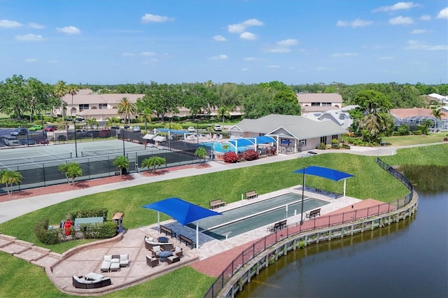 exterior space with a water view and a residential view