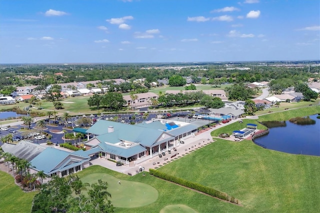 birds eye view of property featuring a residential view, a water view, and golf course view
