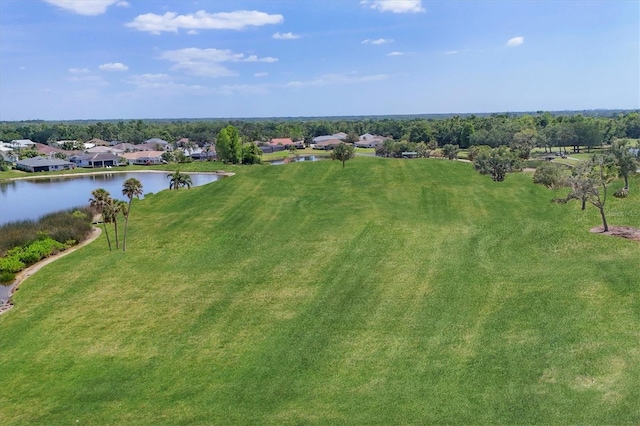 aerial view featuring a water view and a residential view
