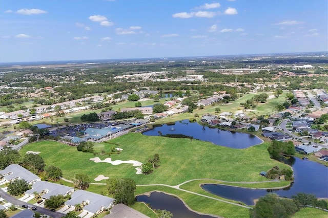 birds eye view of property with a water view and a residential view