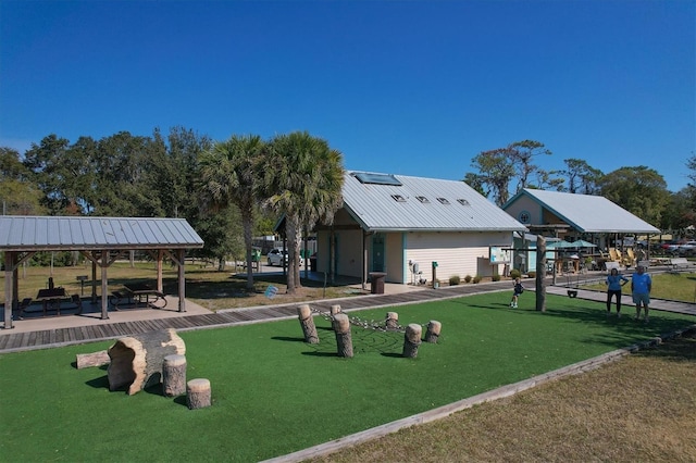 view of property's community featuring a gazebo and a yard