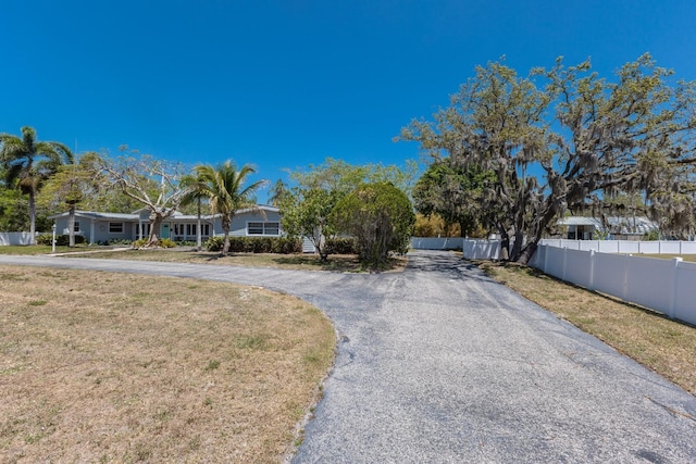 2723 59th St, Sarasota, FL 34243 - view of front of property featuring fence and driveway