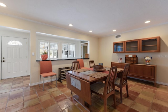 2723 59th St, Sarasota, FL 34243 - dining room featuring recessed lighting, baseboards, visible vents, and ornamental molding
