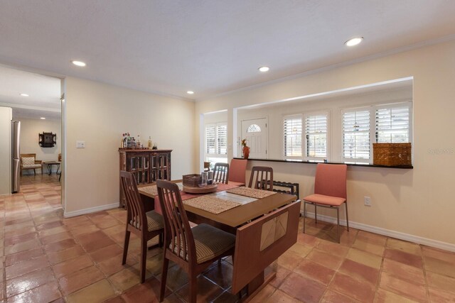 2723 59th St, Sarasota, FL 34243 - dining area with baseboards, ornamental molding, and recessed lighting