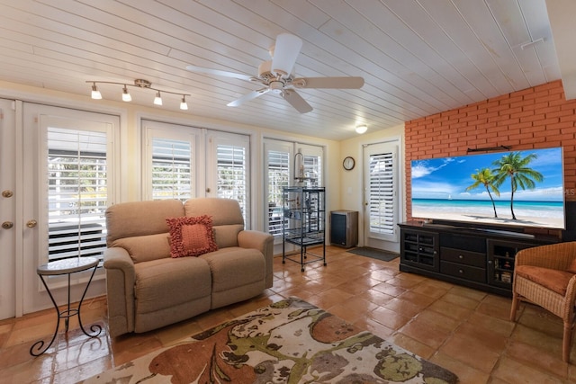 2723 59th St, Sarasota, FL 34243 - living room featuring tile patterned flooring and ceiling fan