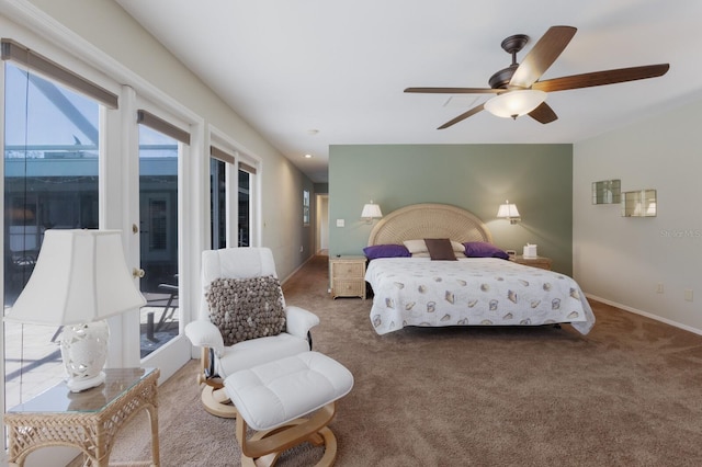 2723 59th St, Sarasota, FL 34243 - carpeted bedroom featuring baseboards, access to exterior, and ceiling fan